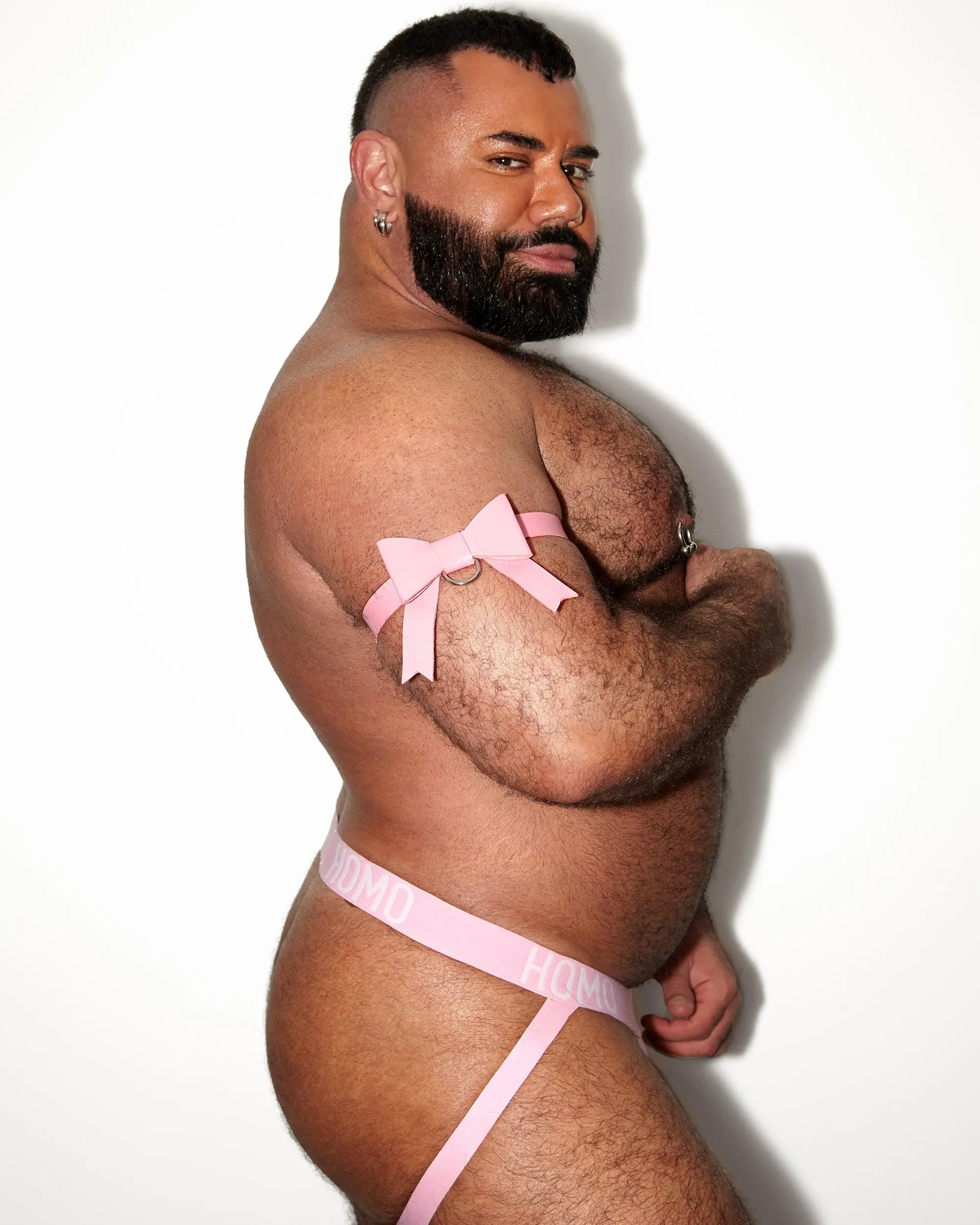 Get the look! Pink bow outfit. Includes bicep bands and classic jock